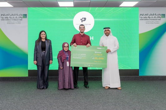 TechPreneur's winning team holding the prize for winning Qatar Innovation Hackathon 2025.